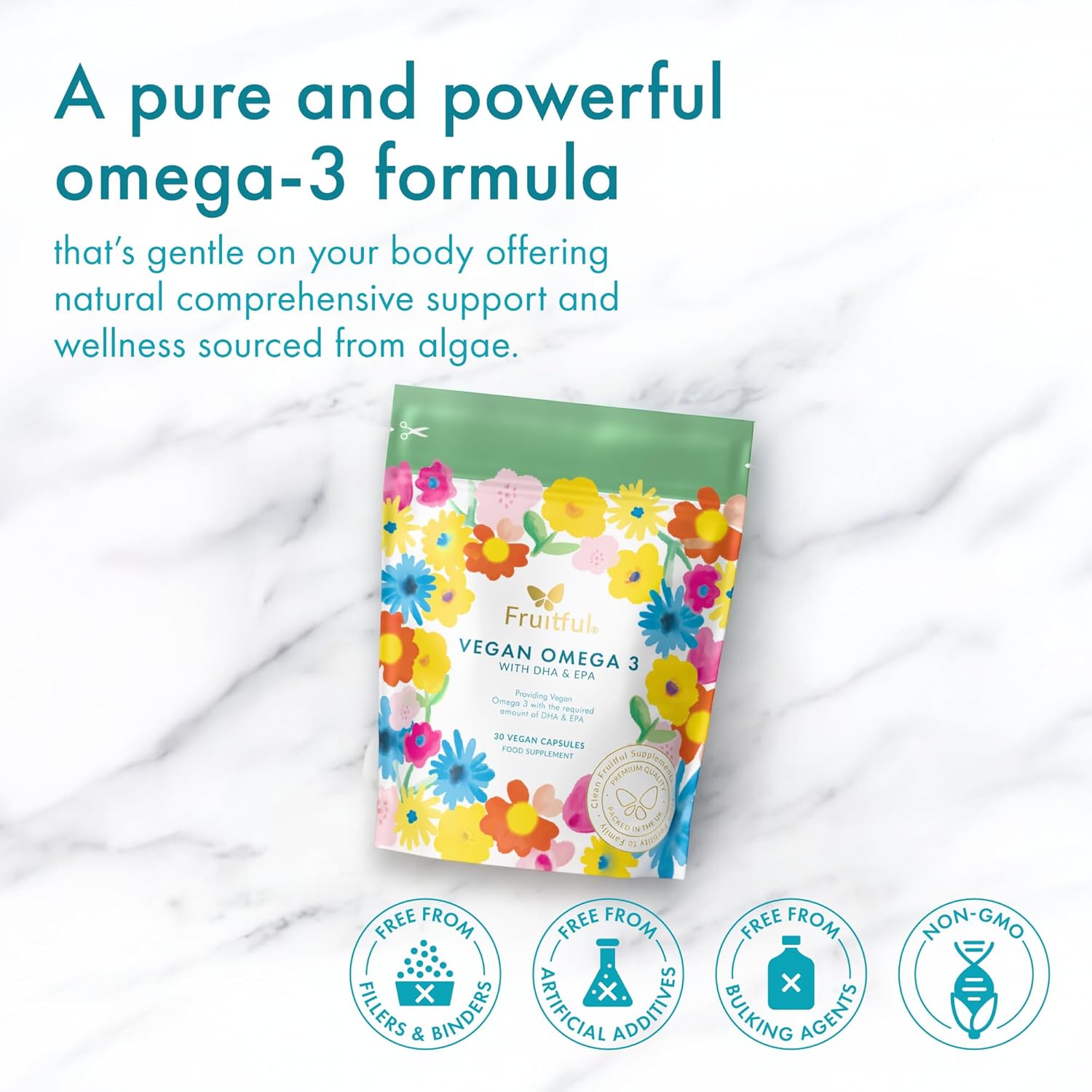 Vegan omega-3 supplement package with colorful floral design on a white marble background